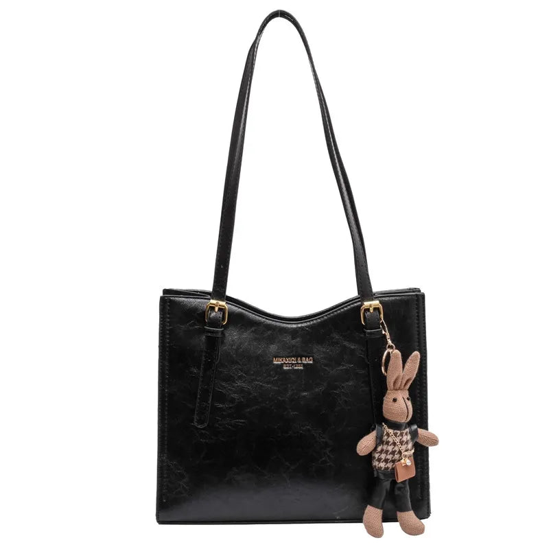 Iris™ - Sac en cuir avec breloque lapin offerte